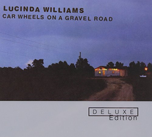 Car Wheels On A Gravel Road
